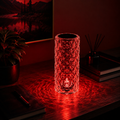MahMir Crystal Diamond Table Lamp glowing red with ripple light patterns on a desk