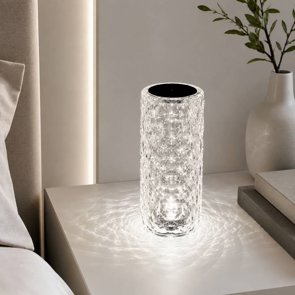 Clear Crystal Diamond Table Lamp in white light on a bedside table