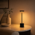 MahMir Lumi Rechargeable Touch LED Table Lamp in black on a marble side table