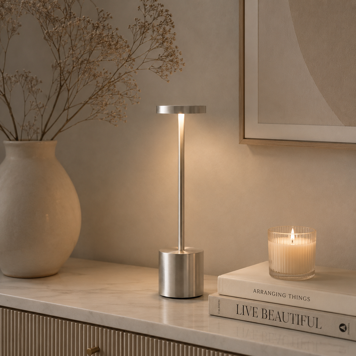 MahMir Lumi Rechargeable Touch LED Table Lamp in silver on a marble dresser