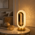 MahMir Oval Crystal Table Lamp casting light patterns on a living room wall